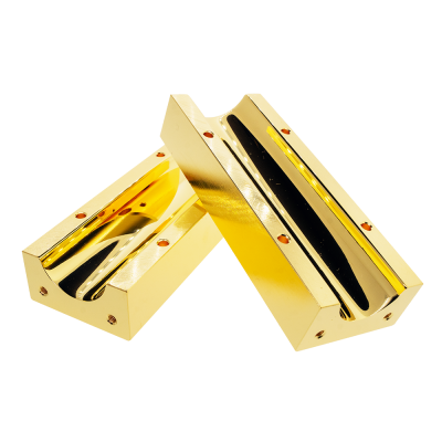 Two Gold Reflectors resting across each other.